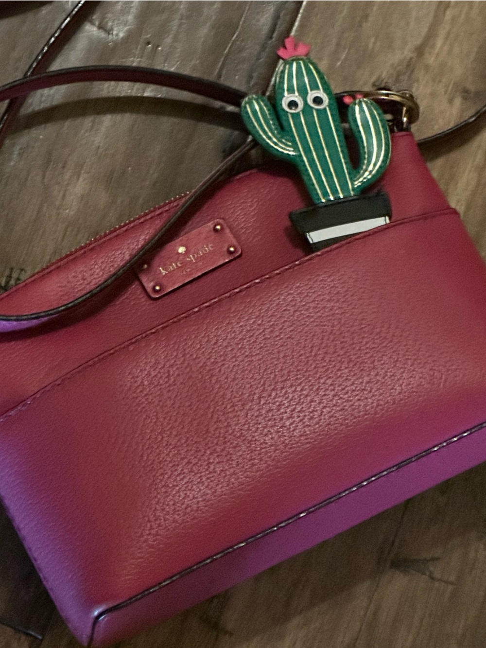 kate spade magenta leather crossbody with cactus charm